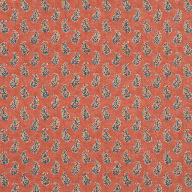 Coral-red woven fabric with small teal, cream and olive paisley motifs