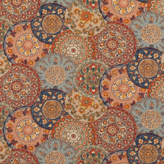 Rust red and indigo circular medallions with floral and ochre detailing