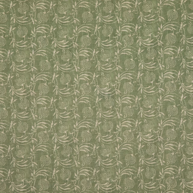 Muted sage green fabric with ivory curling botanical motifs and softly slubbed texture