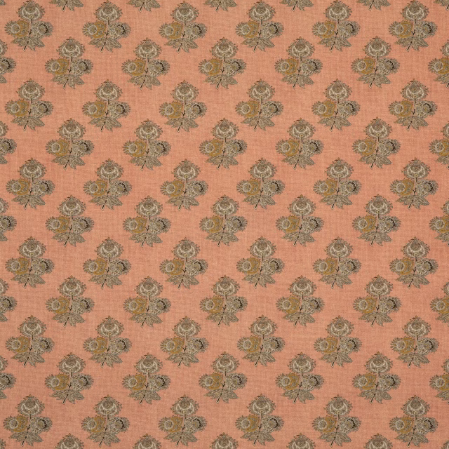 Blush-coral fabric with olive paisley sprigs and a fine linen-like slub