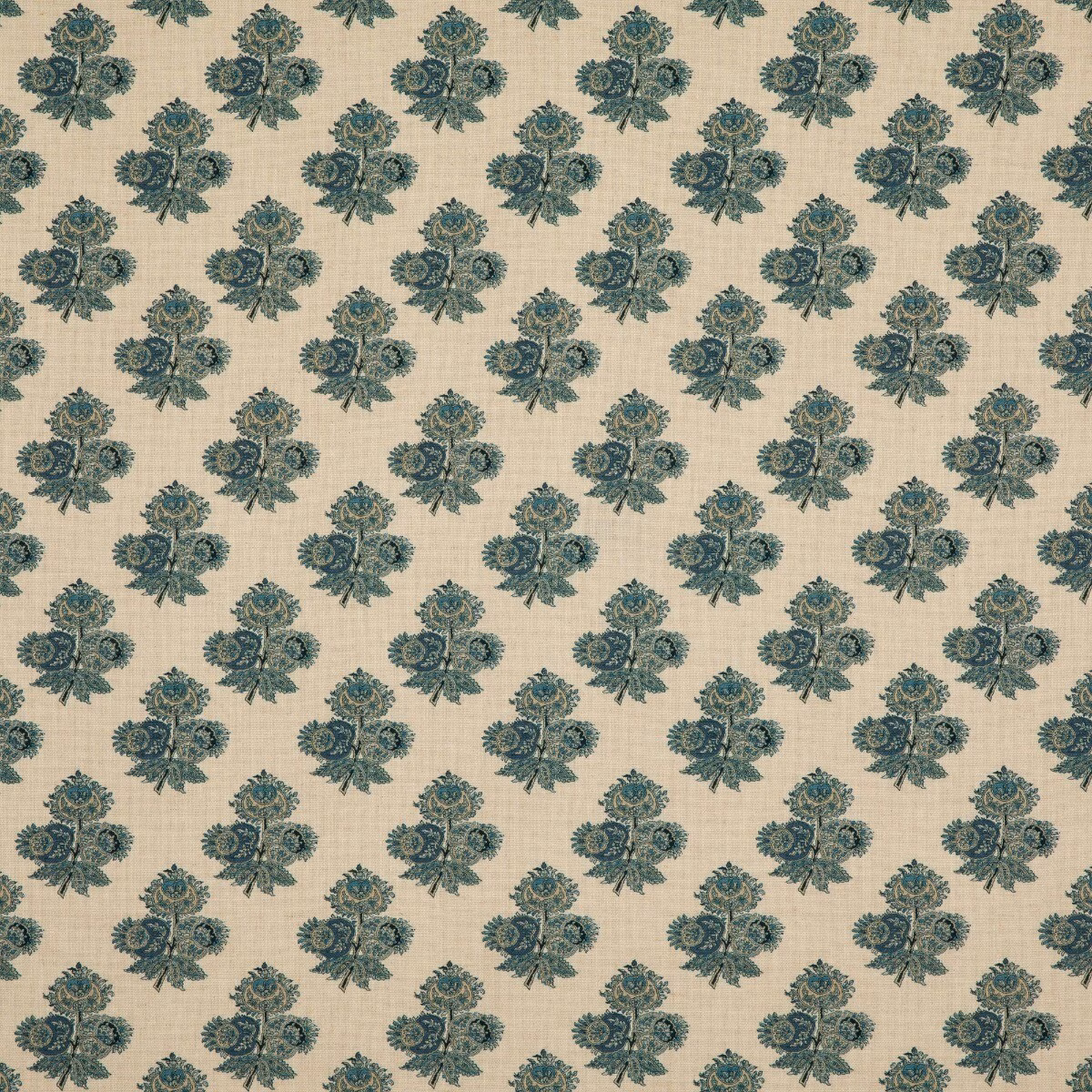 Cream fabric with repeating muted indigo paisley floral clusters and fine woven texture