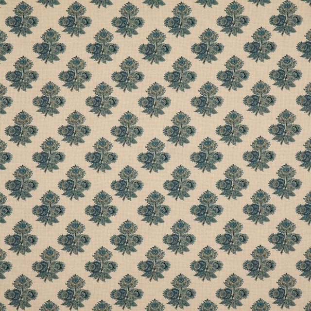 Cream fabric with repeating muted indigo paisley floral clusters and fine woven texture