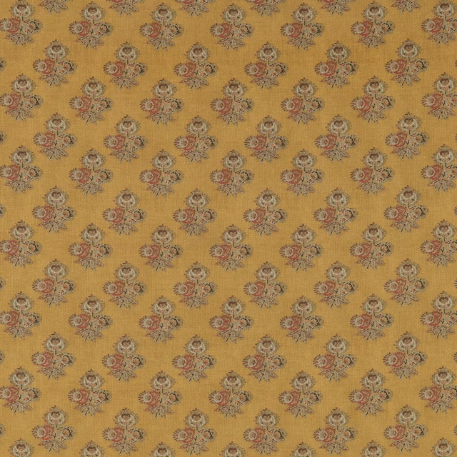 Ochre woven fabric with small rust, cream and grey-green paisley floral motifs