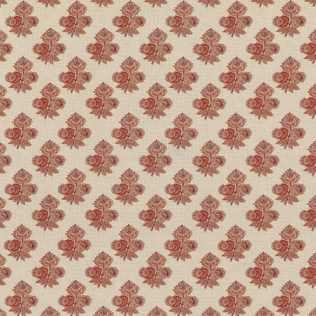 Warm cream fabric with evenly spaced muted red paisley sprigs and fine woven texture