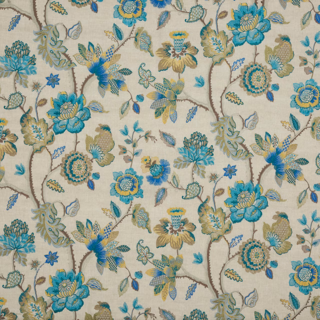 Cream botanical fabric with teal, blue and gilt flowers on branching vines