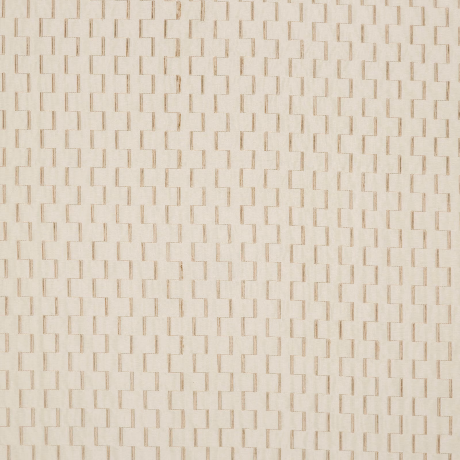 Pale ivory woven fabric with a low-contrast staggered rectangular geometric texture