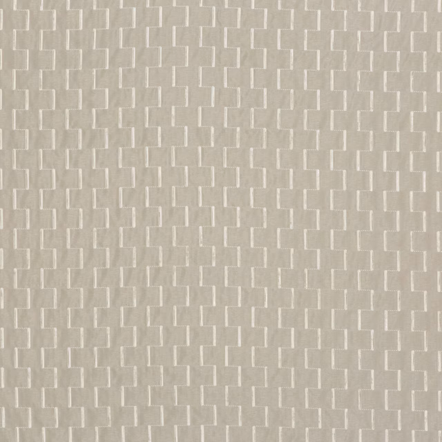 Pale silver-grey textile with a small stepped geometric weave and subtle sheen