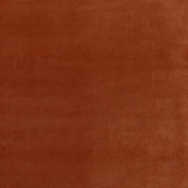 Warm amber-rust velvet with a softly shaded, plain surface