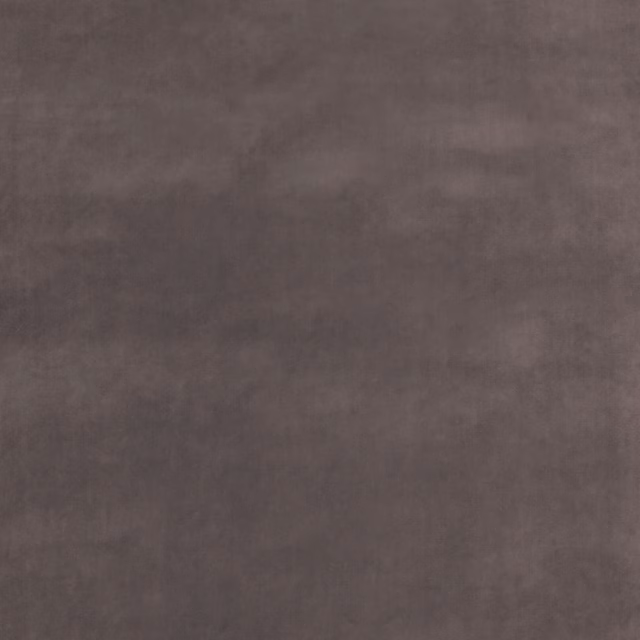 Close-up of cool silver-grey velvet with softly mottled nap and subtle sheen