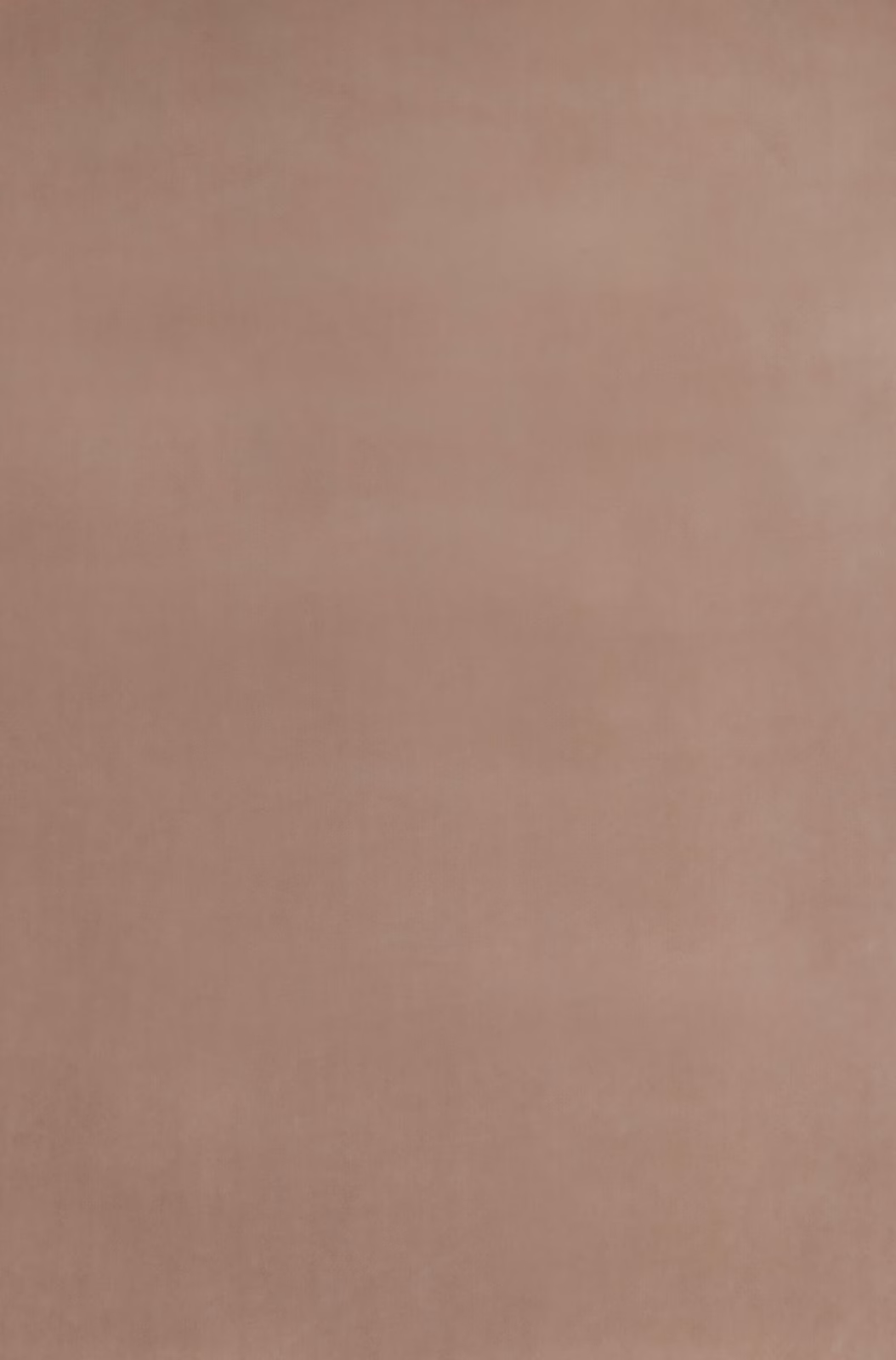 Muted rosy taupe velvet with softly shifting pile and a plain surface