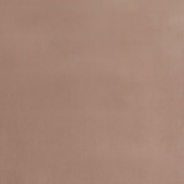 Muted rosy taupe velvet with softly shifting pile and a plain surface