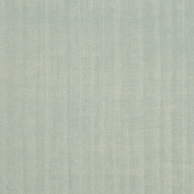 Pale aqua wallpaper with subtle vertical striations and a softly burnished surface