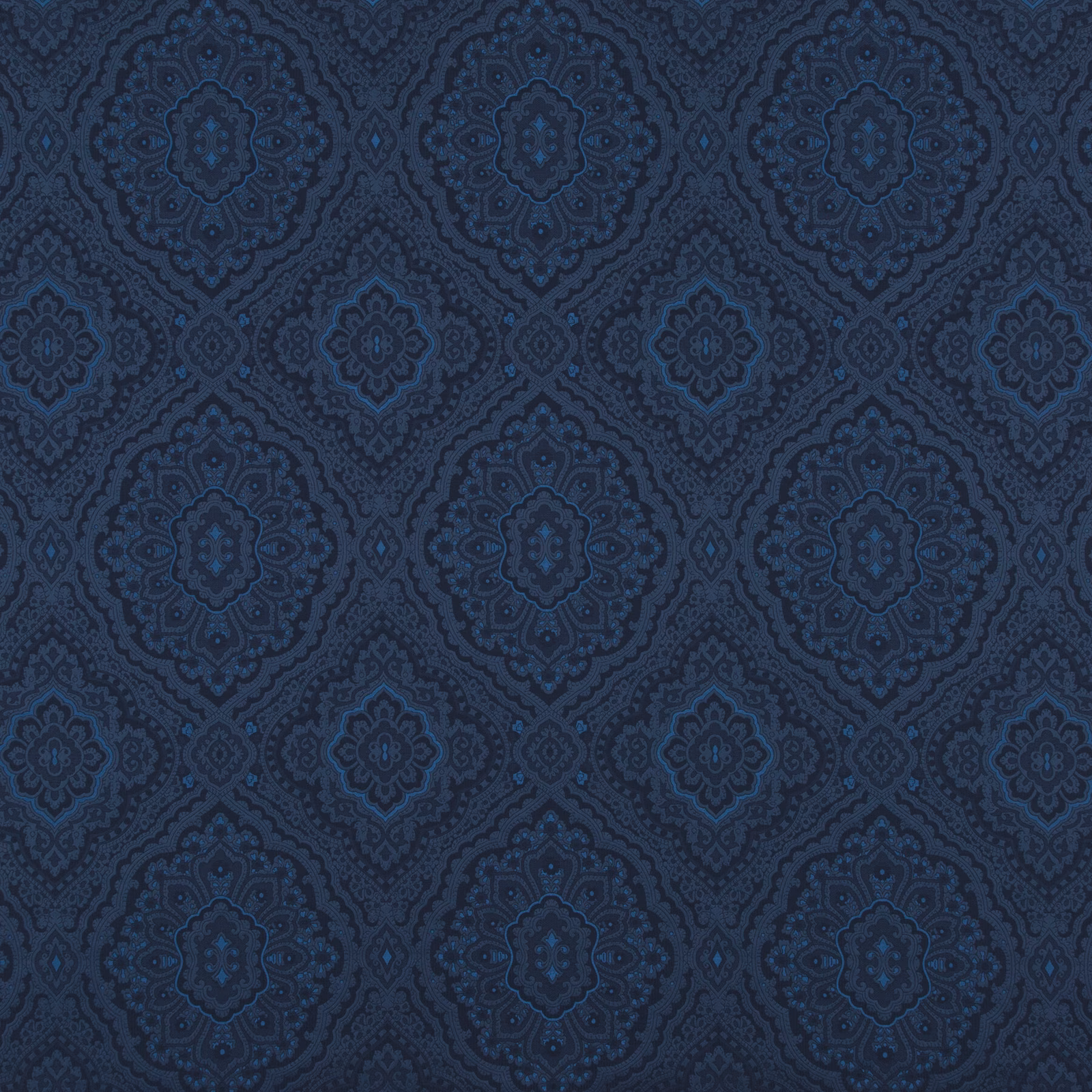 Deep indigo damask fabric with repeating blue medallions and intricate tonal woven detail