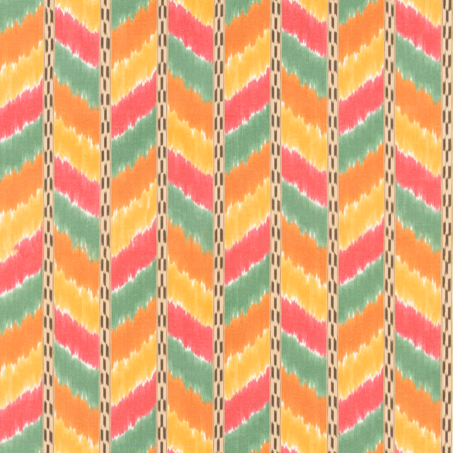 Multicoloured woven ikat fabric with coral, orange, green and yellow zigzags