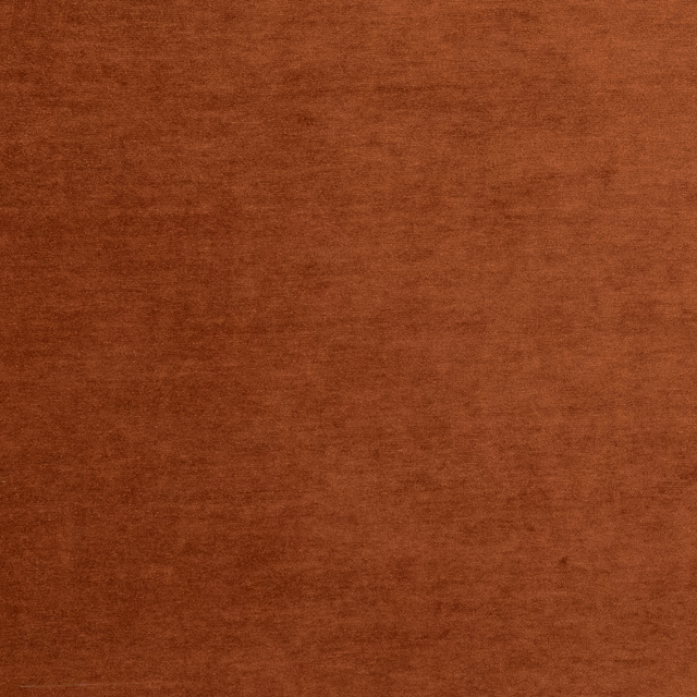 Close-up of warm chestnut brown fabric with a softly brushed, subtly tonal surface