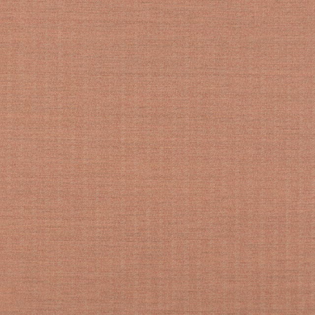 Close-up of muted terracotta Canyon Spice fabric with a fine crosswoven texture