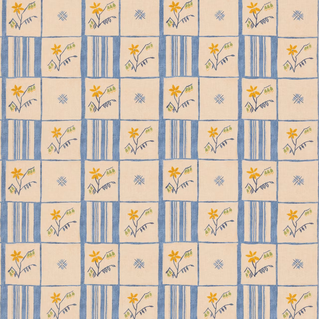 Soft blue and cream patchwork grid with yellow flowers and fine sprig motifs