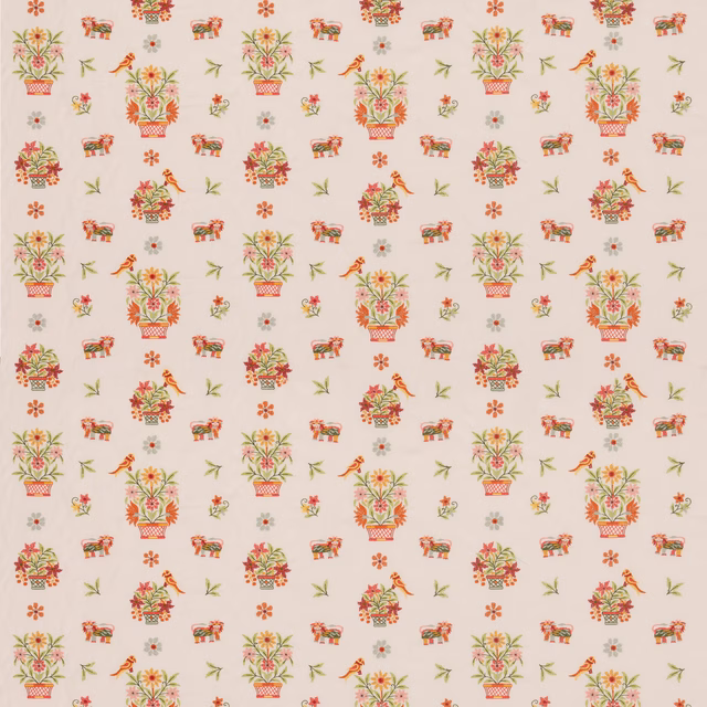 Cream floral fabric with green, coral and ochre bouquet motifs in a scattered repeat