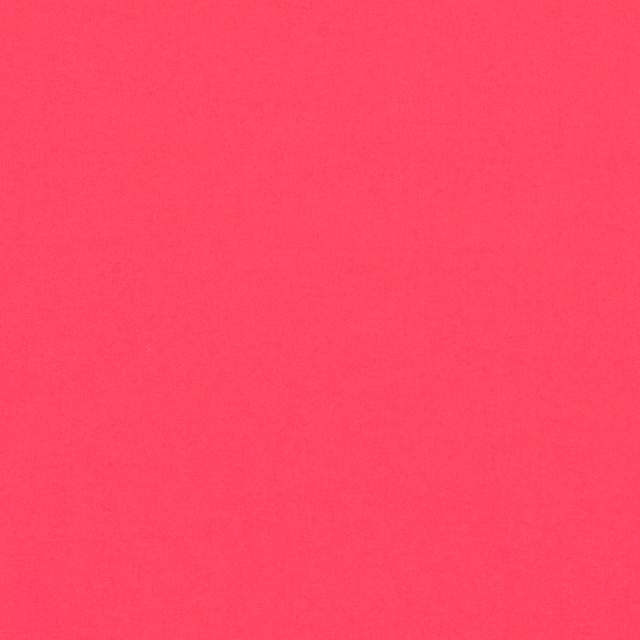 Vivid raspberry pink plain woven fabric with a softly mottled linen texture