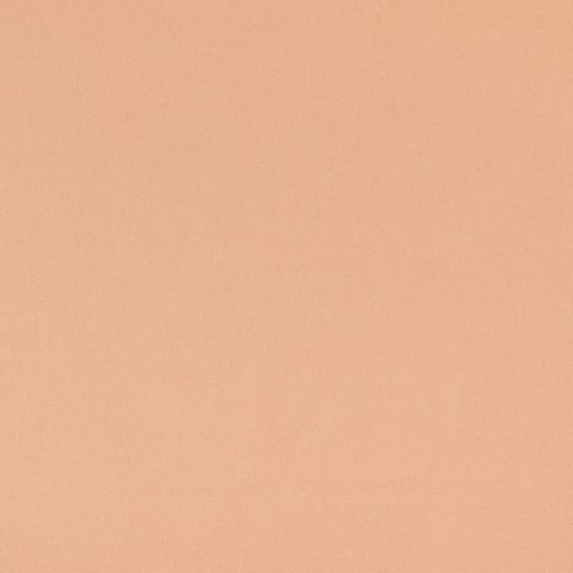 Warm plaster-peach fabric with a softly mottled, fine woven surface