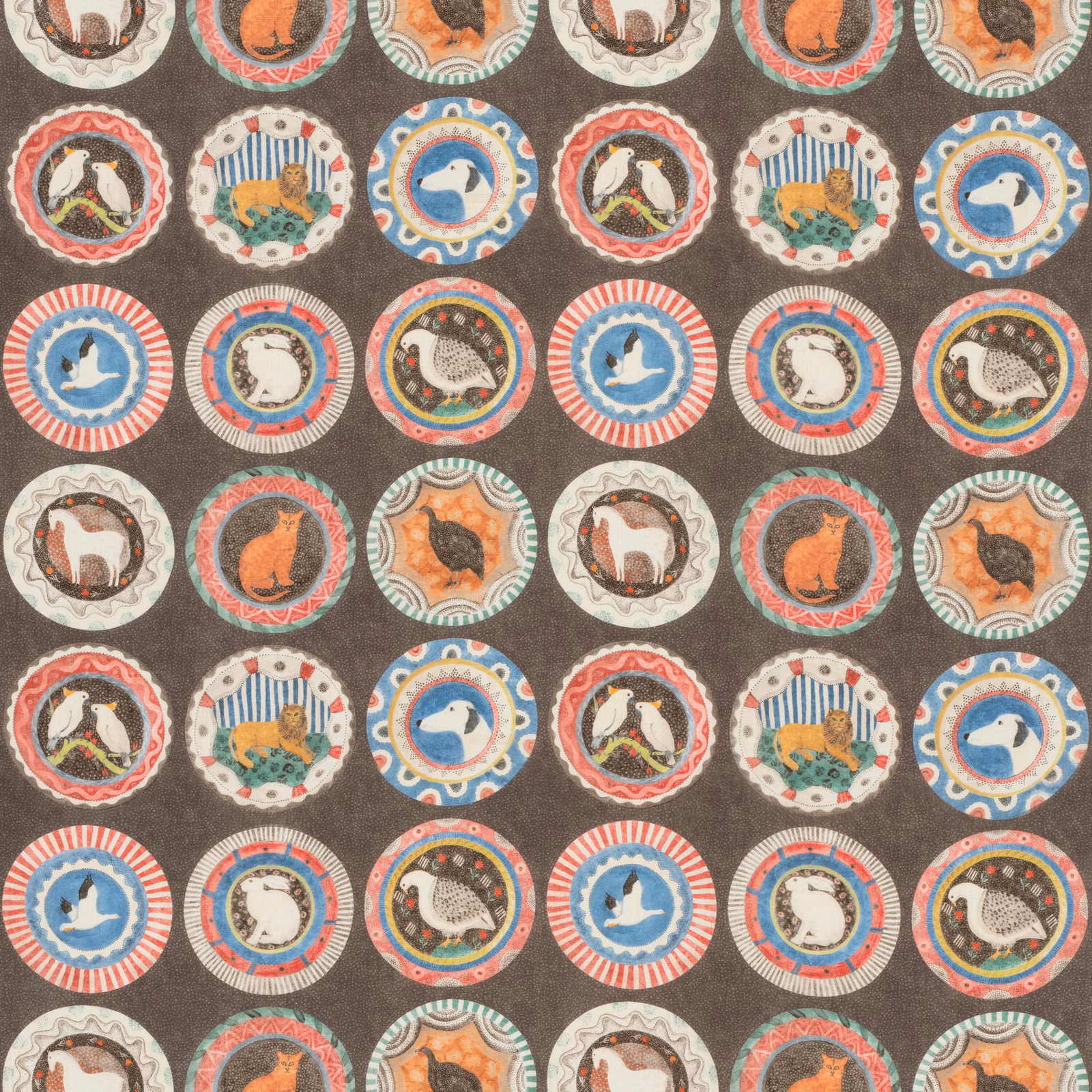 Cocoa brown fabric with colourful circular animal medallions and lightly textured ground