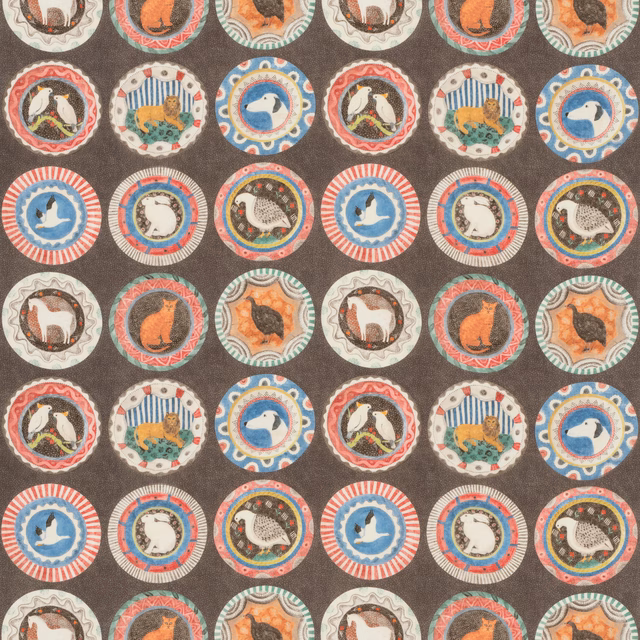 Cocoa brown fabric with colourful circular animal medallions and lightly textured ground