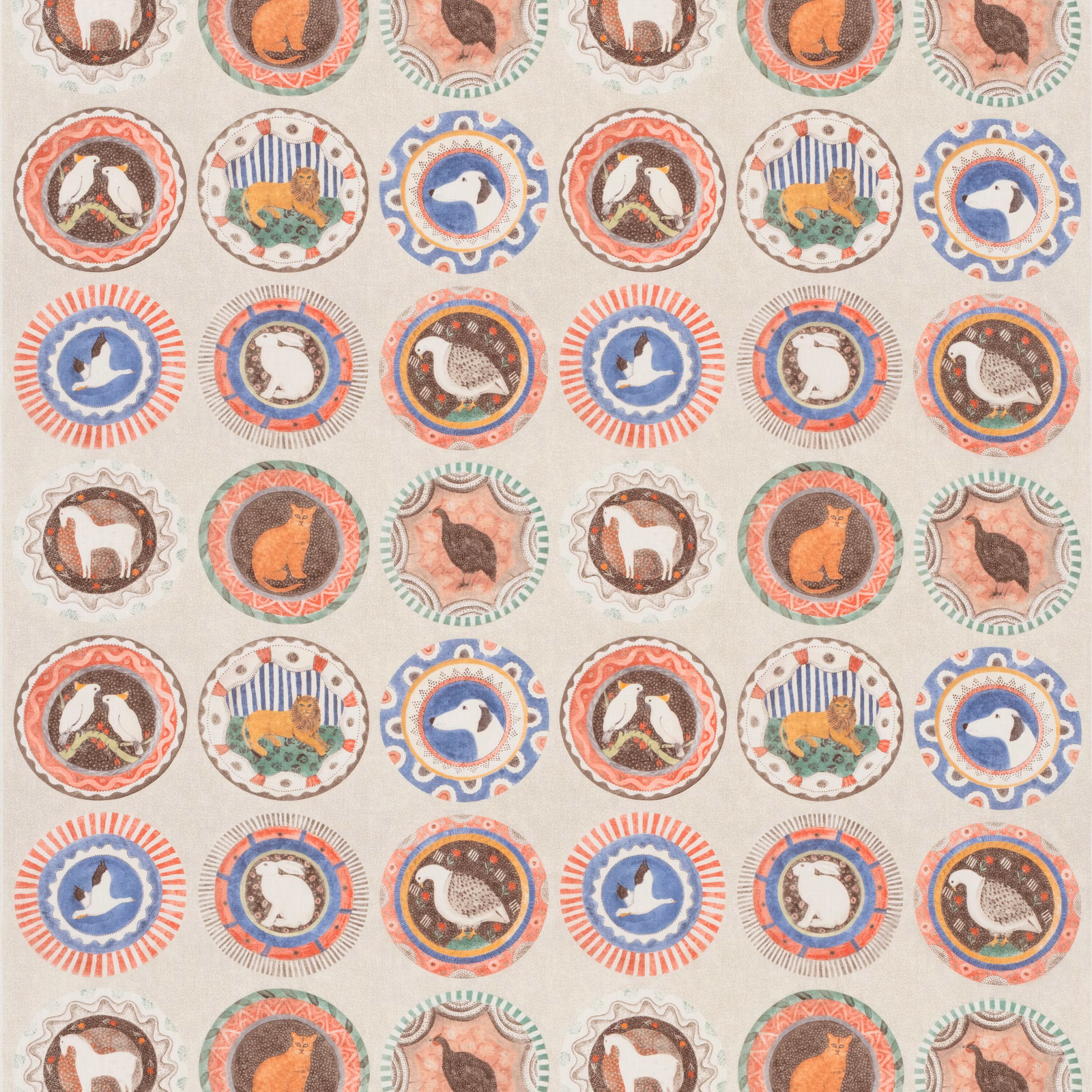 Cream fabric with coral, teal and blue circular animal medallions