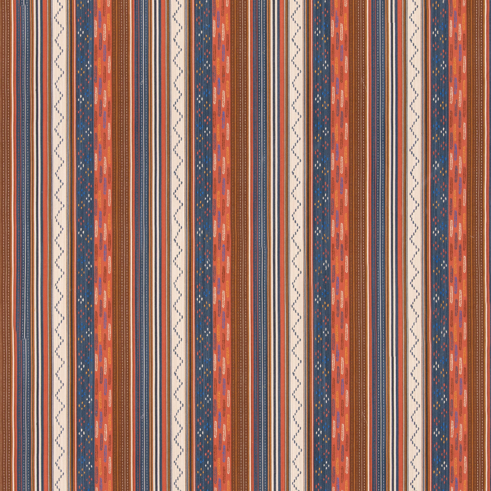 Coral and indigo vertical stripe fabric with cream zigzags and woven flecks