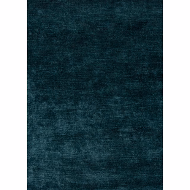 Deep teal velvet with softly mottled pile and horizontal light-catching texture