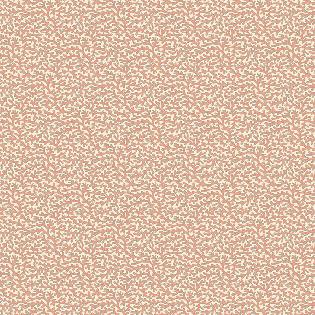 Dusty soft red wallpaper covered in dense tiny cream sprig marks