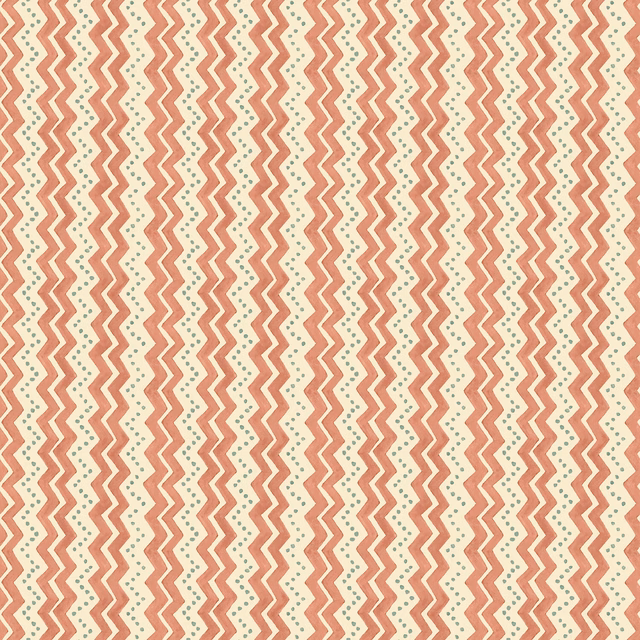 Soft red zigzag columns repeat over a pale cream wallpaper ground