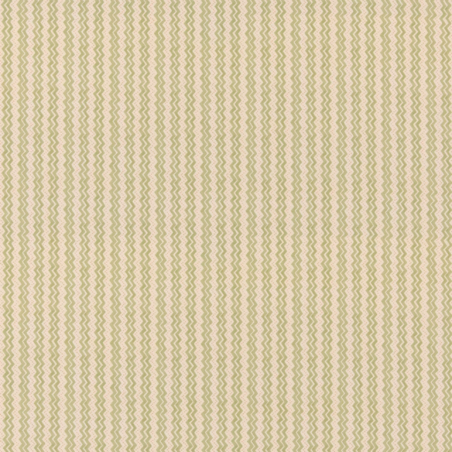 Soft sage-green zigzags run vertically over a warm cream cotton ground