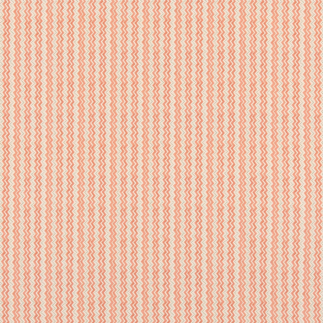 Soft coral red zigzags on a pale cream cotton fabric swatch