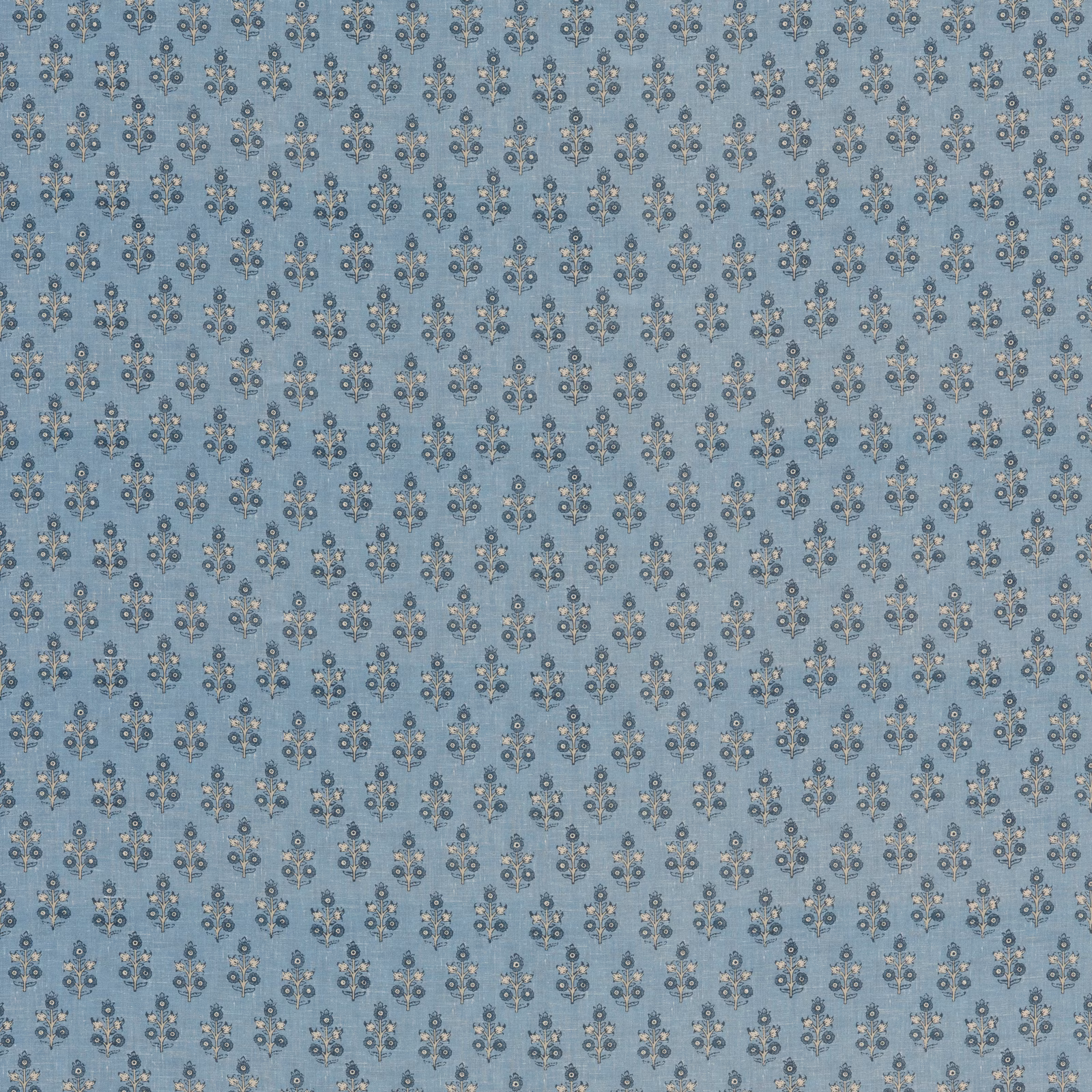 Muted blue linen-blend fabric with tiny navy and cream floral sprigs
