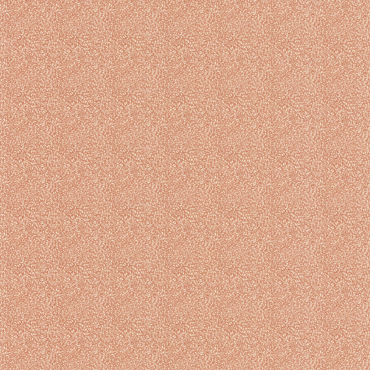 Dusty soft-red cotton with tiny pale tansy motifs in a close scatter