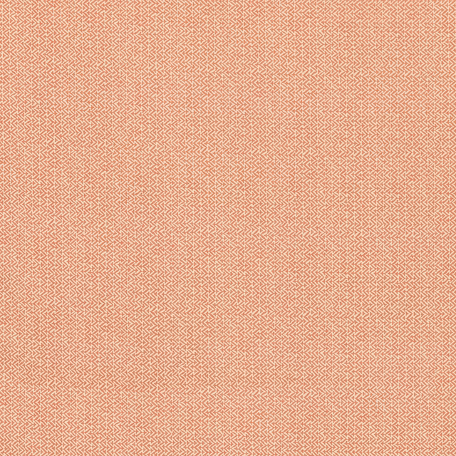 Muted coral-red cotton with a fine cream angular zigzag print