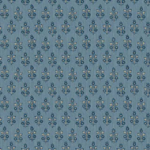 Muted blue wallpaper with repeating navy floral sprigs and small ochre accents