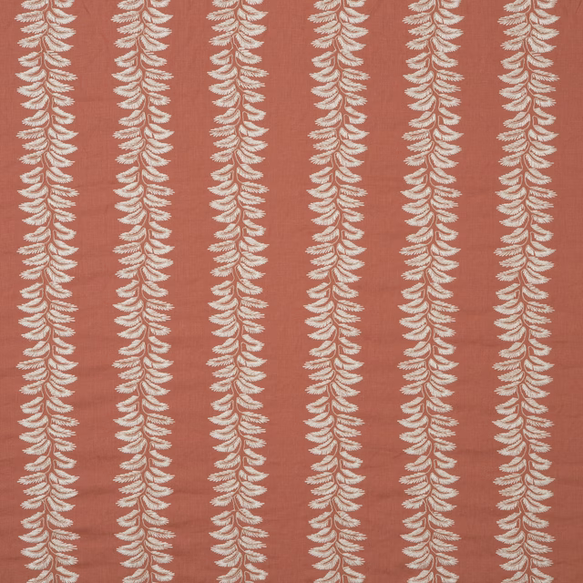 Muted coral terracotta fabric with repeating cream fern stripes and softly textured ground