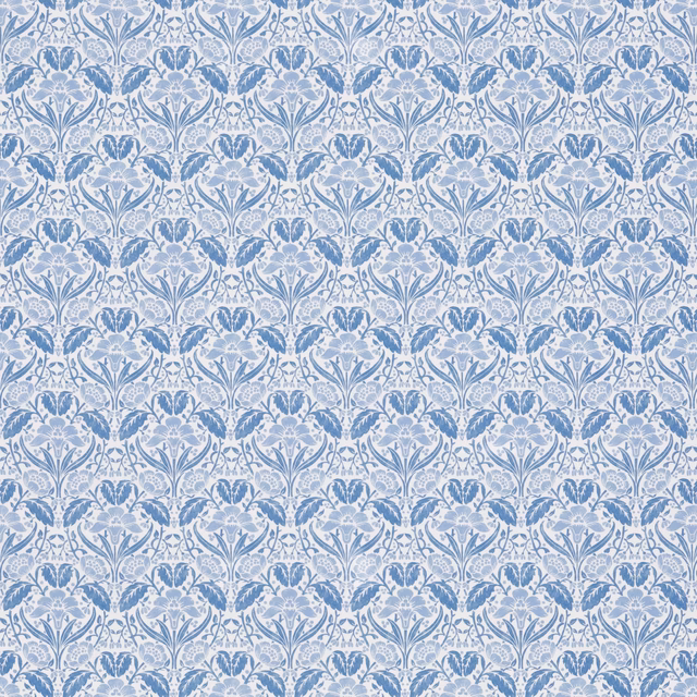 Pale blue cotton with repeating blue floral stems, leaves and stylised flower heads