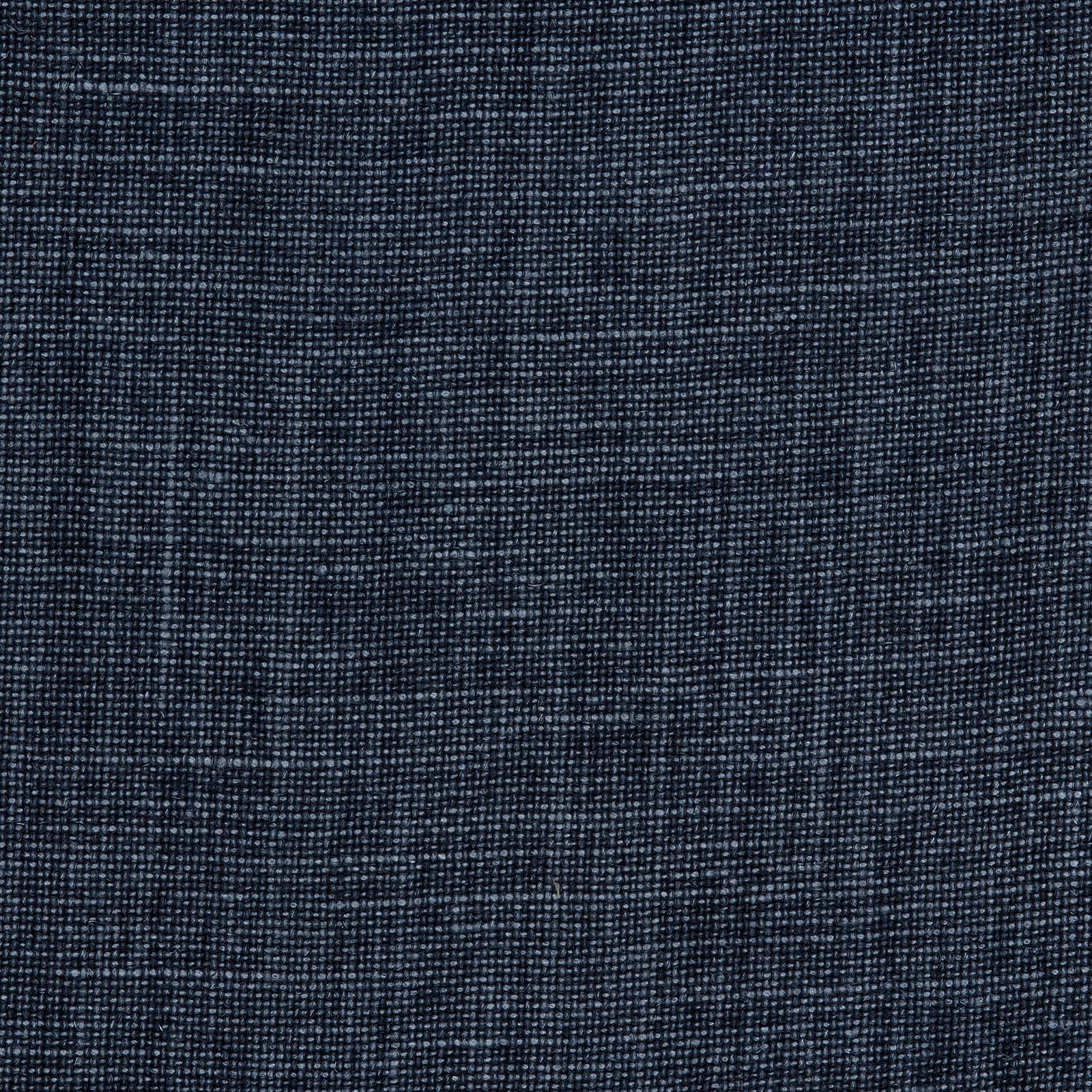 Close-up of weathered charcoal linen with an irregular pale-flecked woven texture