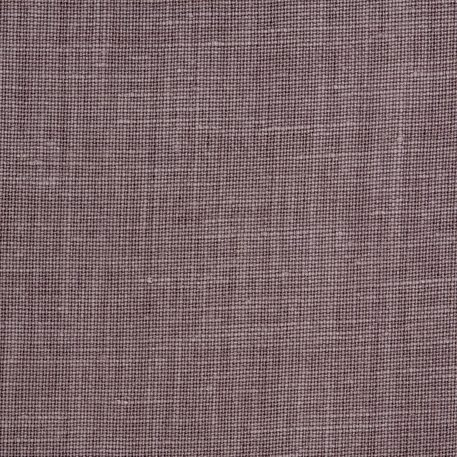 Close-up of muted mauve taupe linen with a weathered crosshatched weave