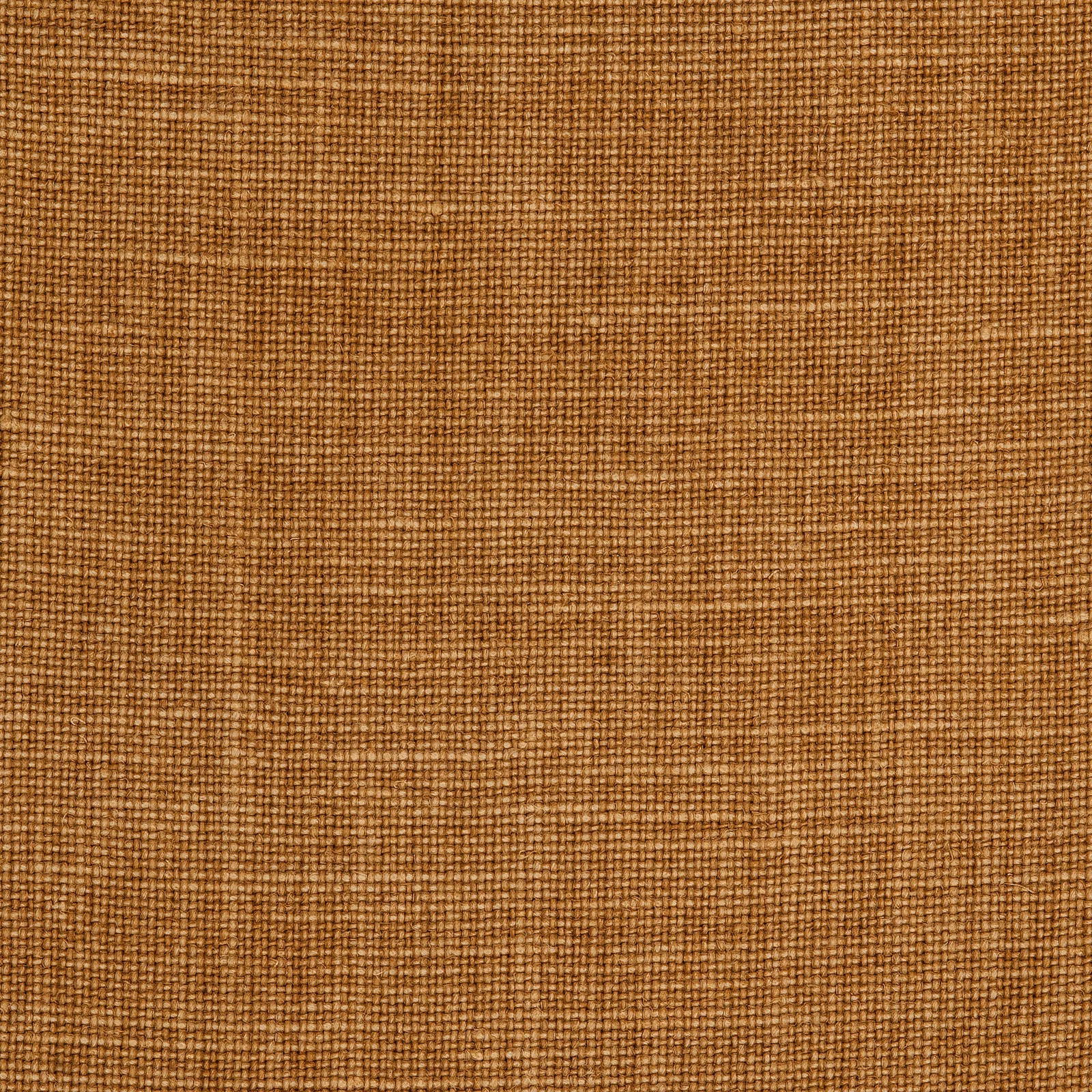 Warm ochre linen showing a coarse, subtly slubbed plain weave
