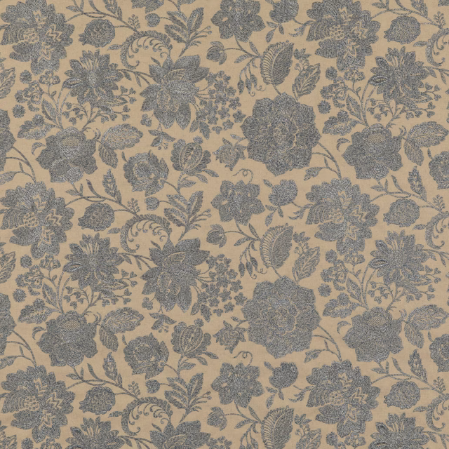 Muted blue-grey floral damask motifs on a warm beige ground, close-up