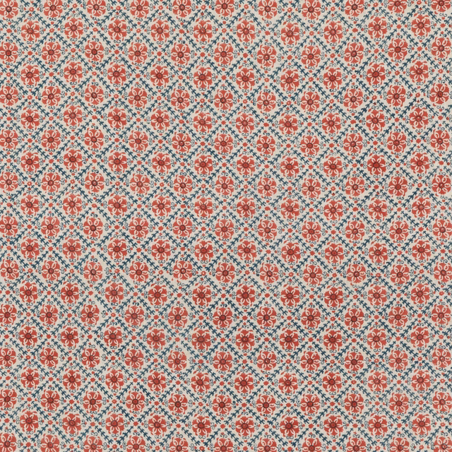 Brick-red floral medallions and blue trellis on textured ivory linen