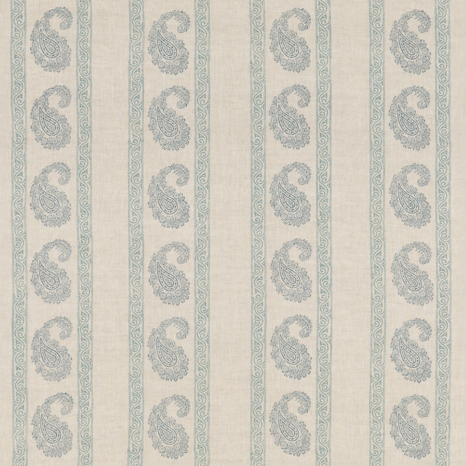 Muted blue-grey paisleys and scrolling bands on textured ivory linen