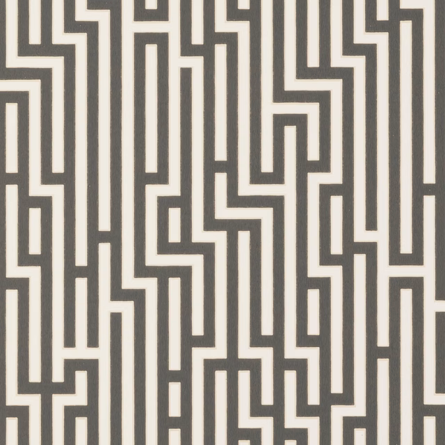 Charcoal and ivory interlocking fretwork wallpaper with angular maze-like lines