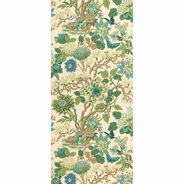 Emerald and teal botanical branches with blue flowers on a cream ground