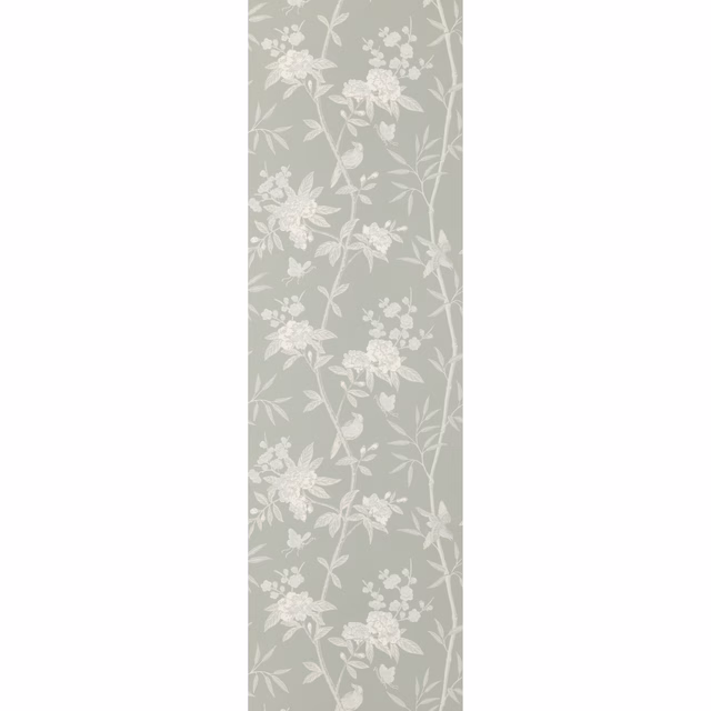 Muted blue-grey wallpaper with white flowering branches and leafy botanical sprays
