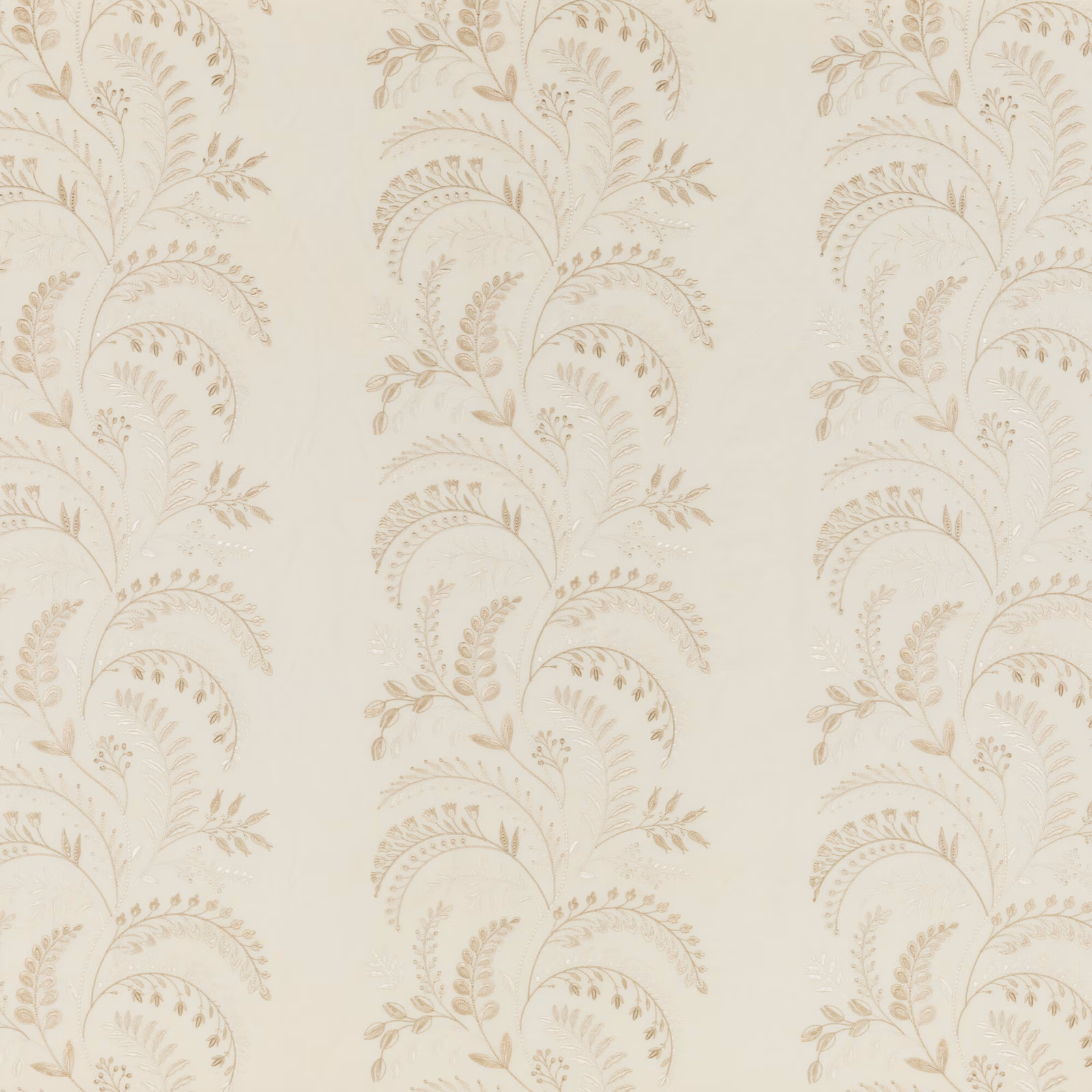 Warm ivory fabric with taupe scrolling botanical motifs and a fine woven texture