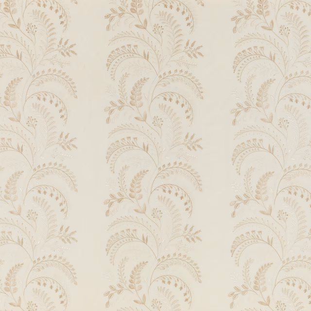 Warm ivory fabric with taupe scrolling botanical motifs and a fine woven texture